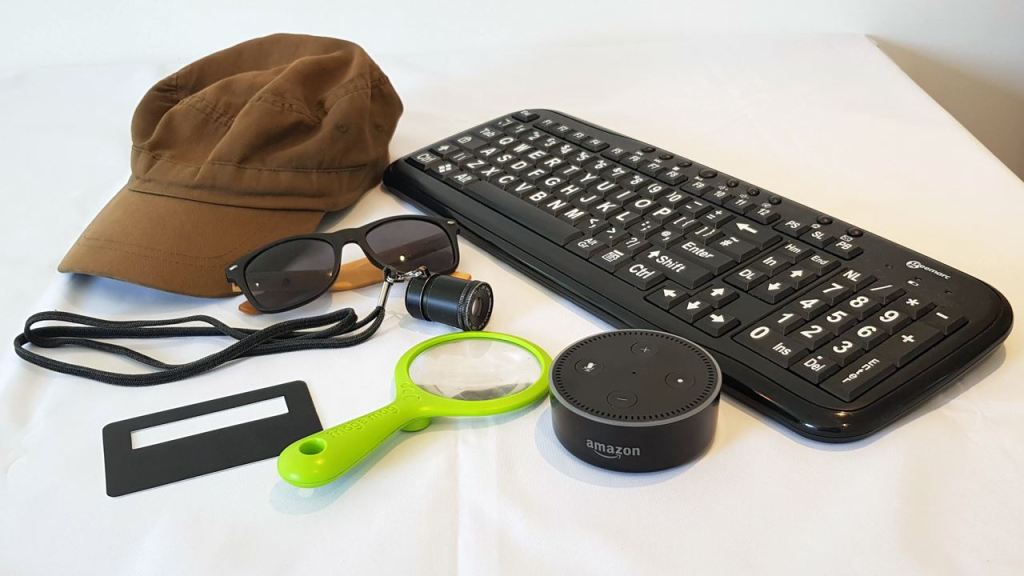 Baseball cap, sunglasses, monocular, high visibility keyboard, signature guide, magnifying glasses, Amazon Echo